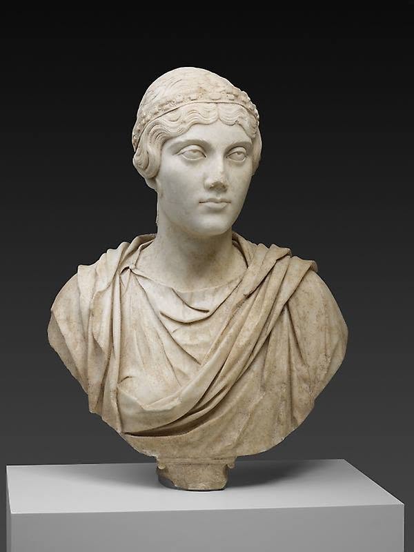 A Roman marble bust of a woman, standing for Cura, the Roman goddess of care